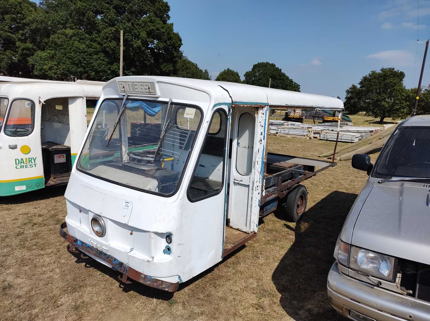 Lot 210 - Three Wheeled White Milk Float. No V5. Reg