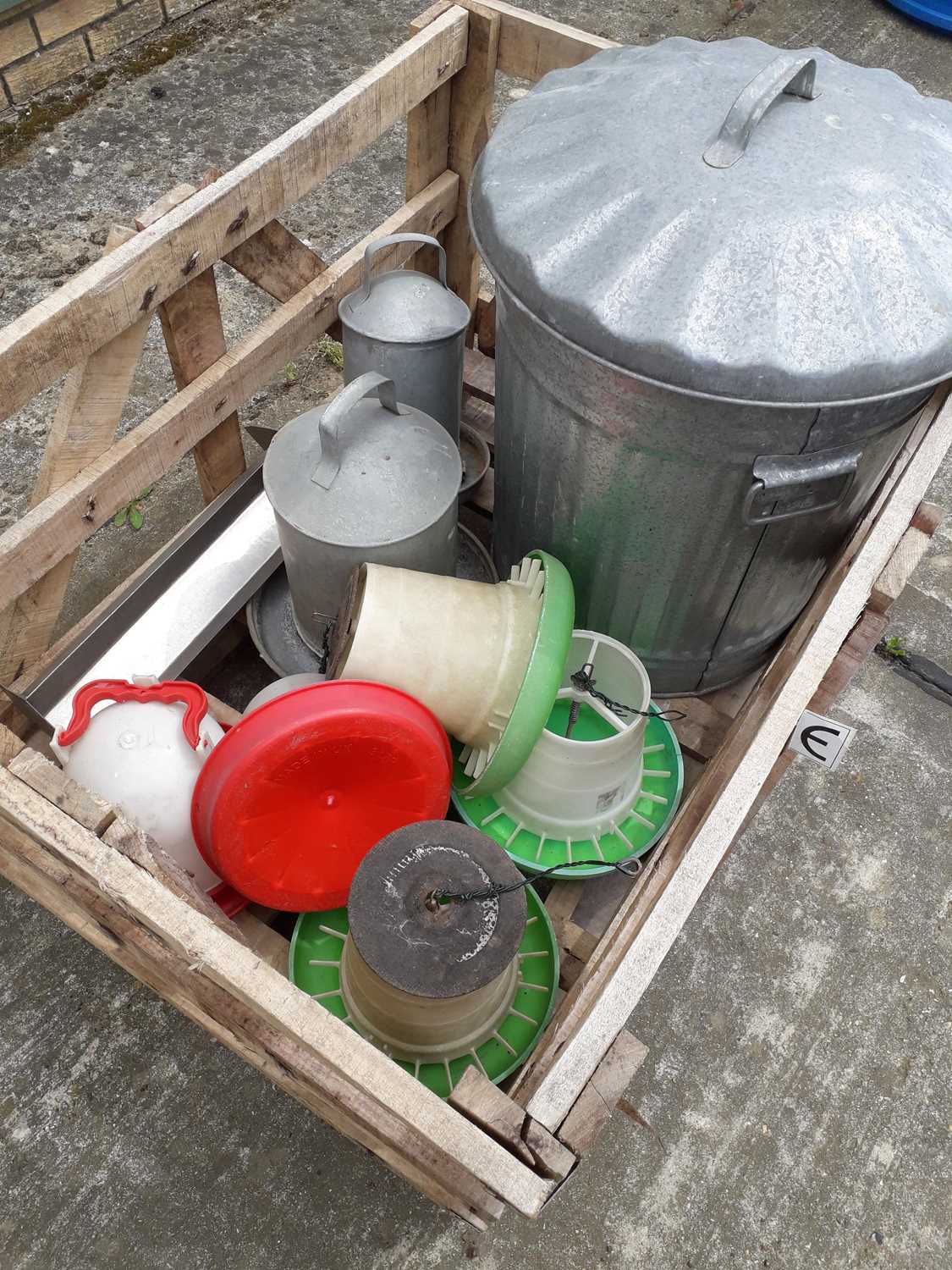 Lot 711 - Galvanised dustbin and poultry feeders and