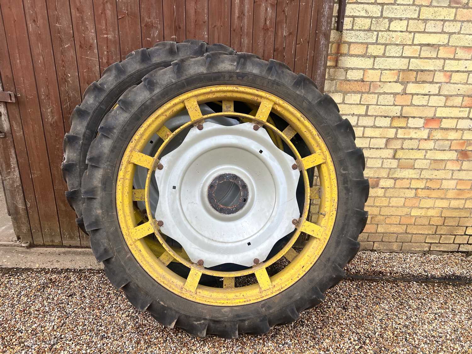 Lot 60 - Pair of rear row crop wheels. MF centres. 9.5-