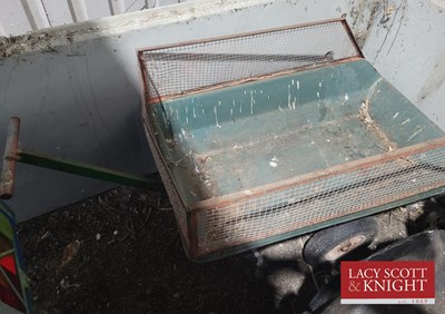 Lot 19 - Pull along plastic barrow with metal mesh...