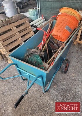 Lot 28 - Large muck out barrow with selection of hand...